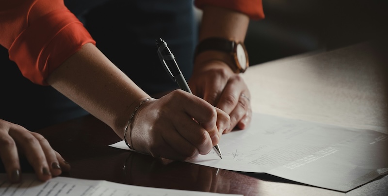 person signing document